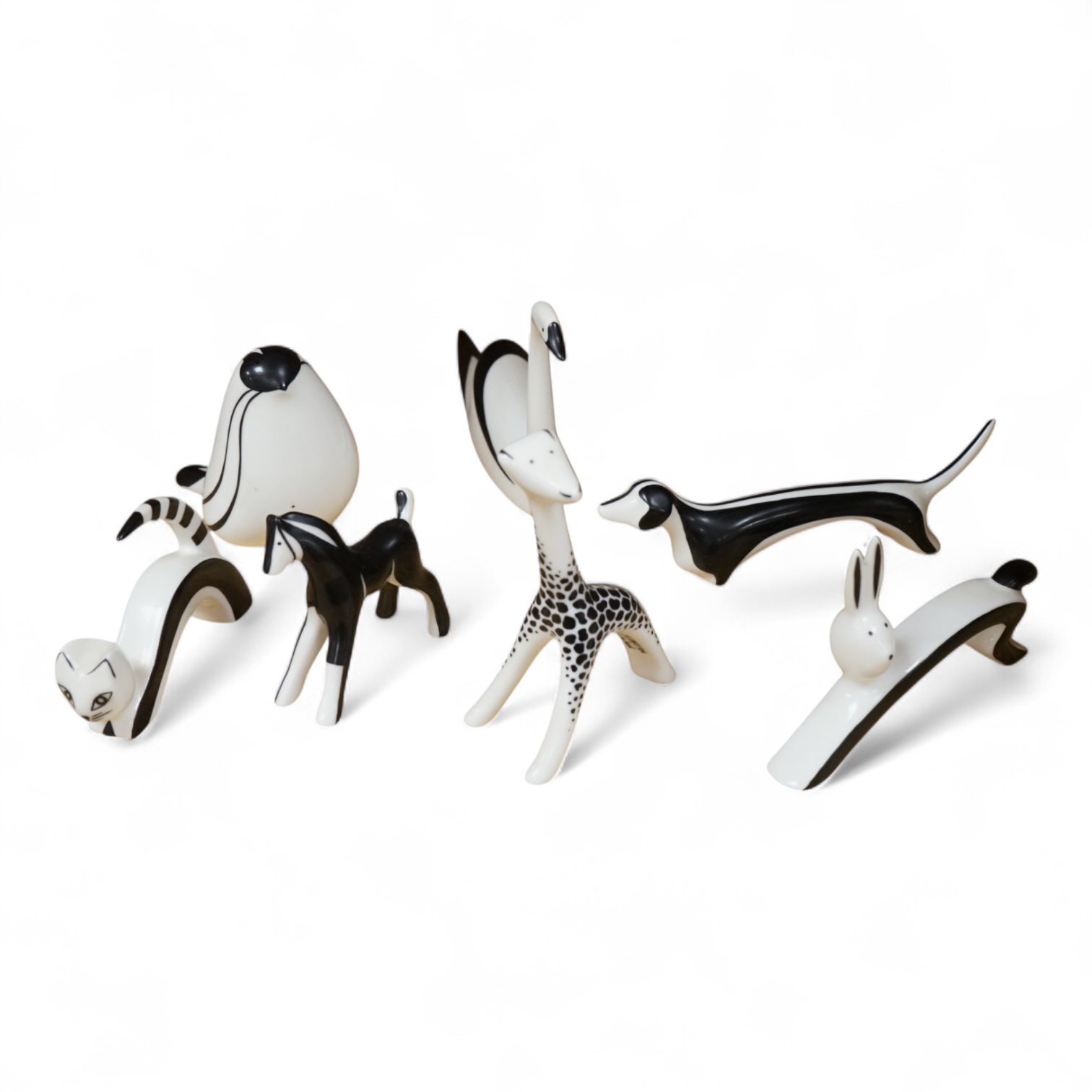 A collection of mid century Cmielow ceramic animals to include cat, rabbit and swan, largest 18cm in length